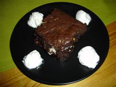 Triple Chocolate and Pecan Brownies with Whipped Cream